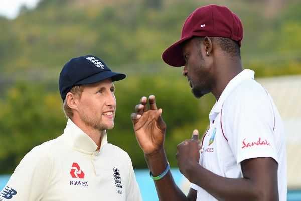 Joe Root and Jason Holder